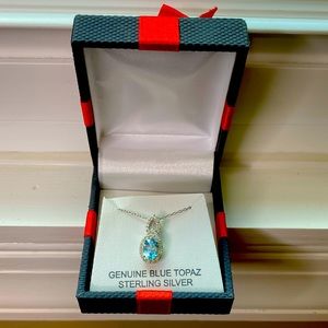 Sterling Silver Cain with a genuine Blue Topaz
